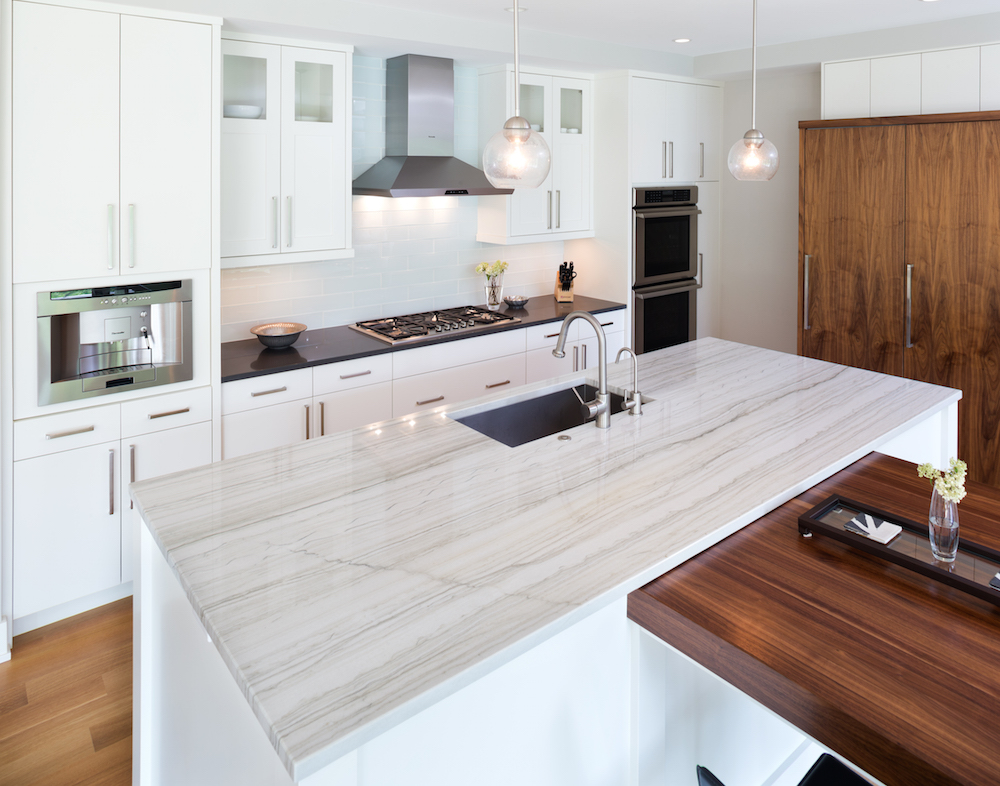 Stone countertops & island in kitchen by C&D Granite