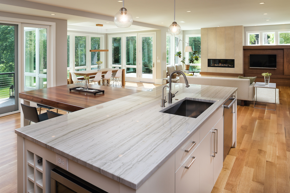 Stone countertops & island in kitchen by C&D Granite