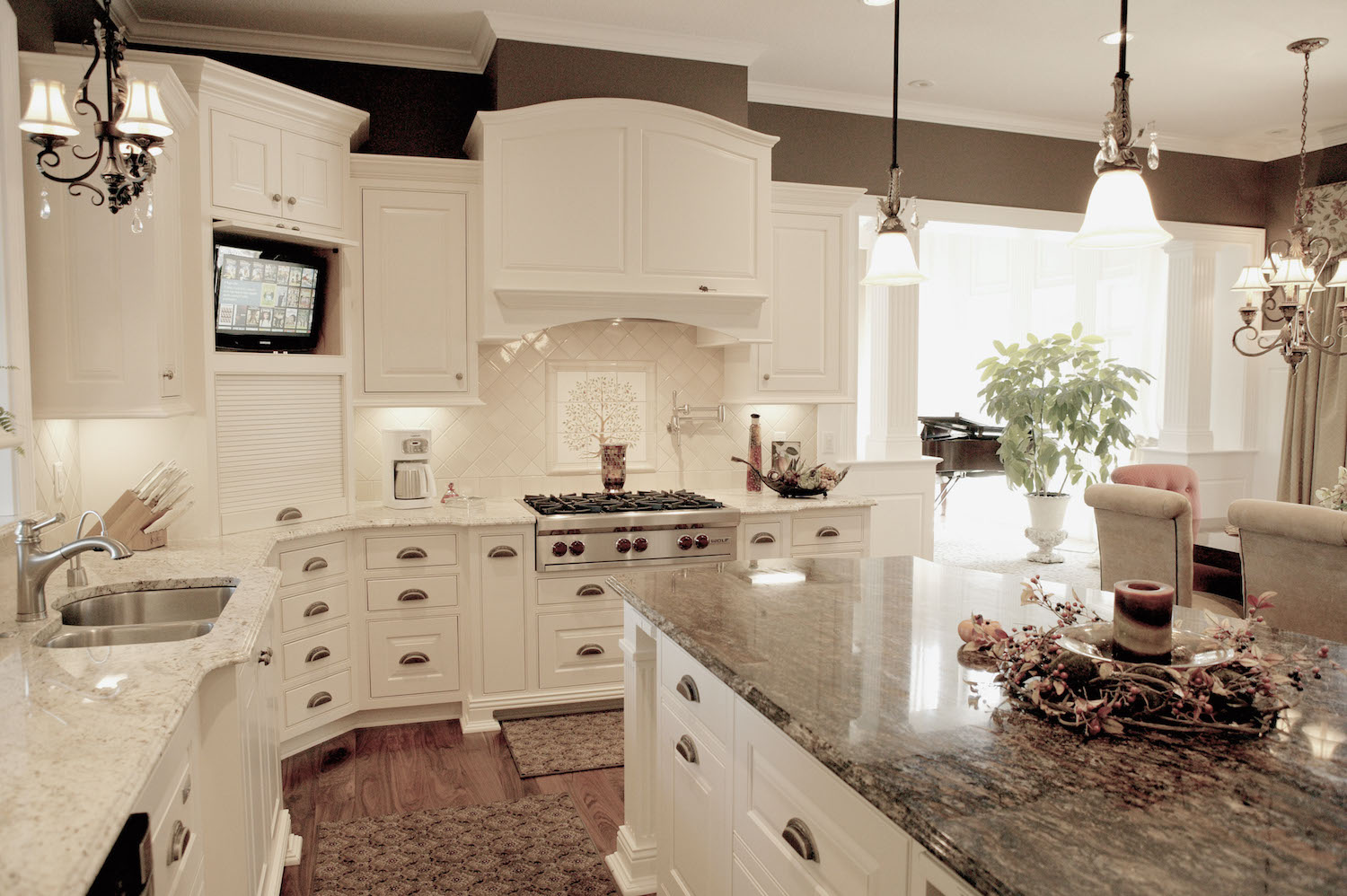 Granite countertops & island in kitchen by C&D Granite