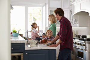 Happy family in new kitchen