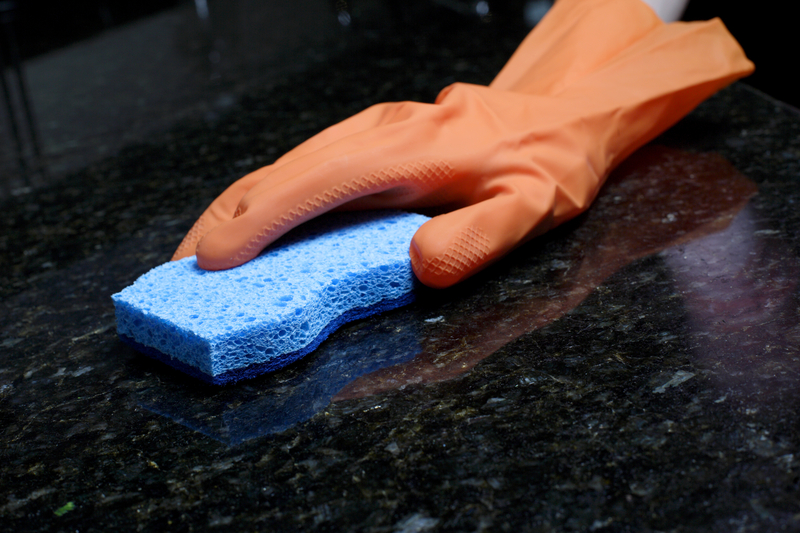 abrasive scouring pad on granite countertop